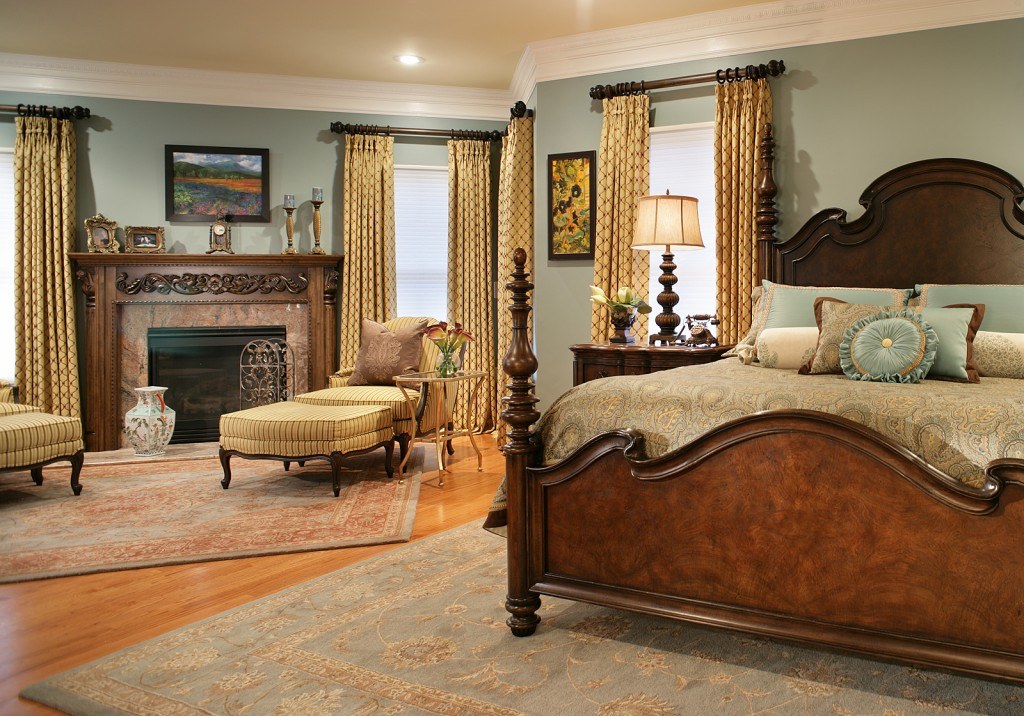 traditional bedroom with blue walls 