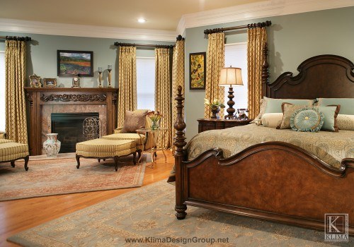 an elegant bedroom design with a fireplace