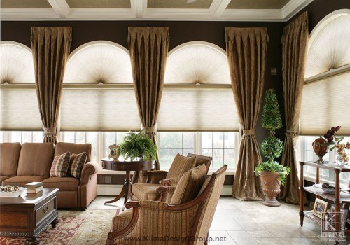 a modern living area with 4 large arched windows