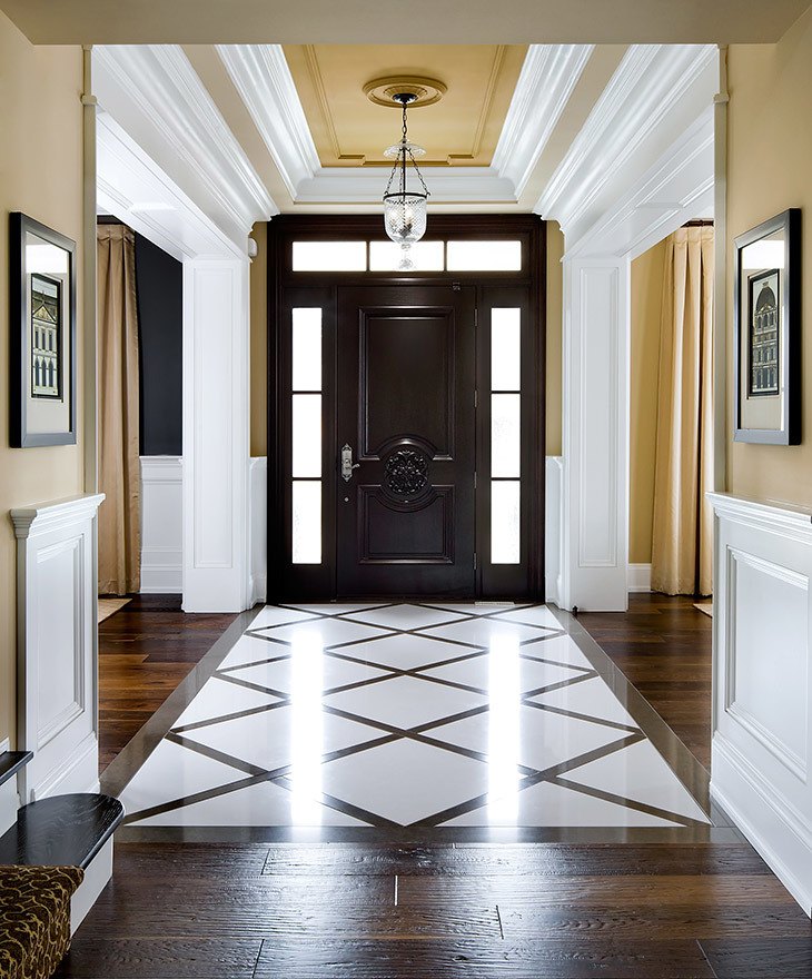 modern designed foyer with geometrical lines designed on wooden floor
