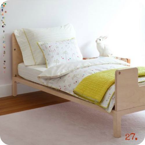 bed with white and yellow bedding