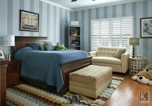 blue themed bedroom with striped walls