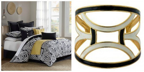 black and white themed bedroom with gold accent