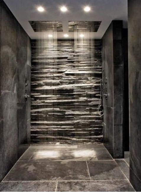 natural stone tiles bathroom with stone back wall 