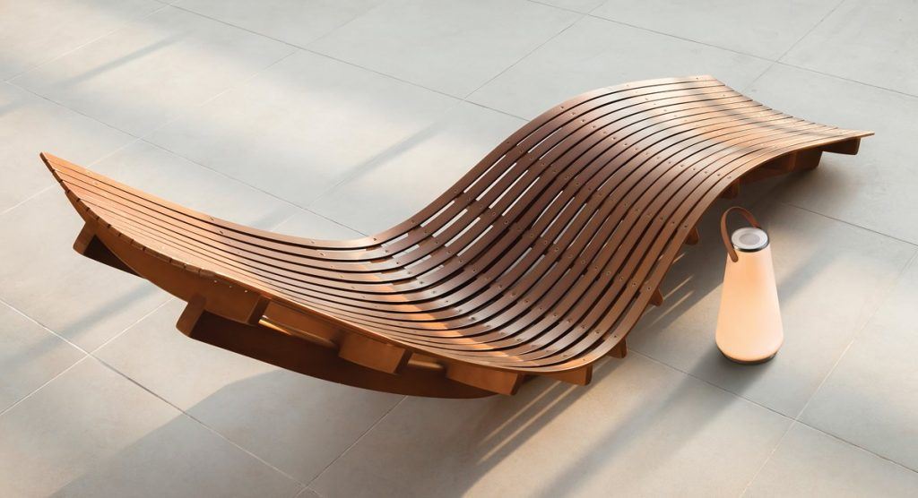 a wooden seat and a lamp on floor