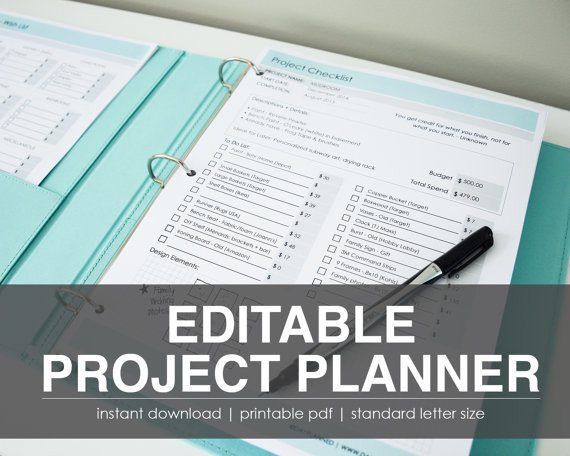 a project planner and a pen