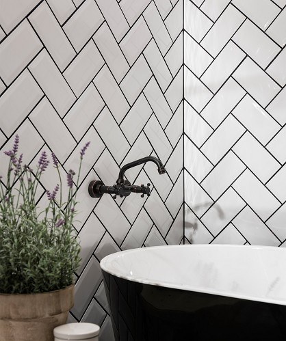 bathroom tiles in herringbone pattern