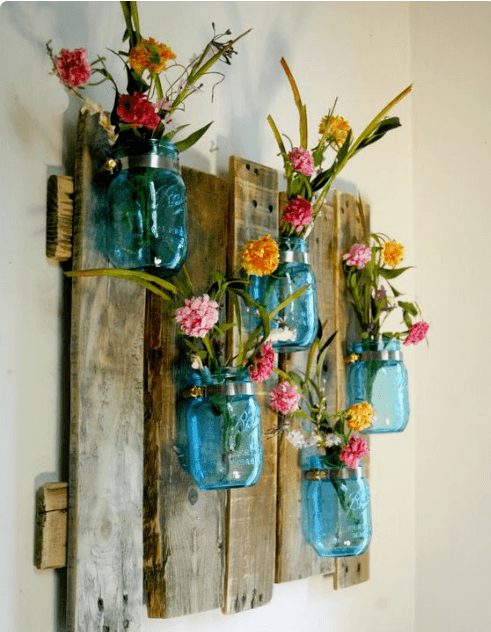 inexpensive flowers in blue containers 