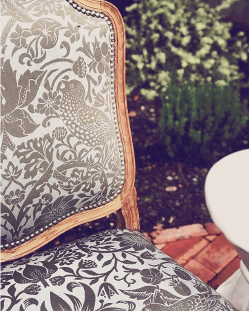 elegant chair upholstered with perennials fabric