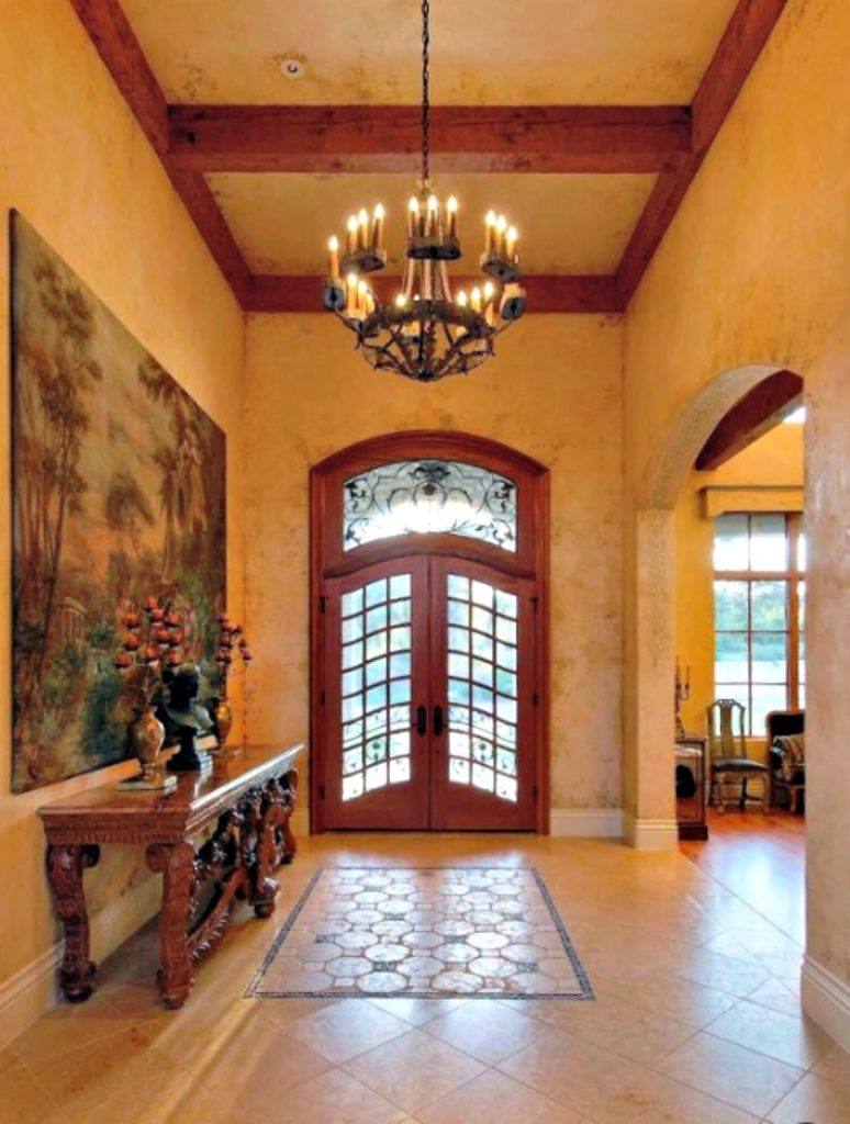 foyer with ceiling beams 