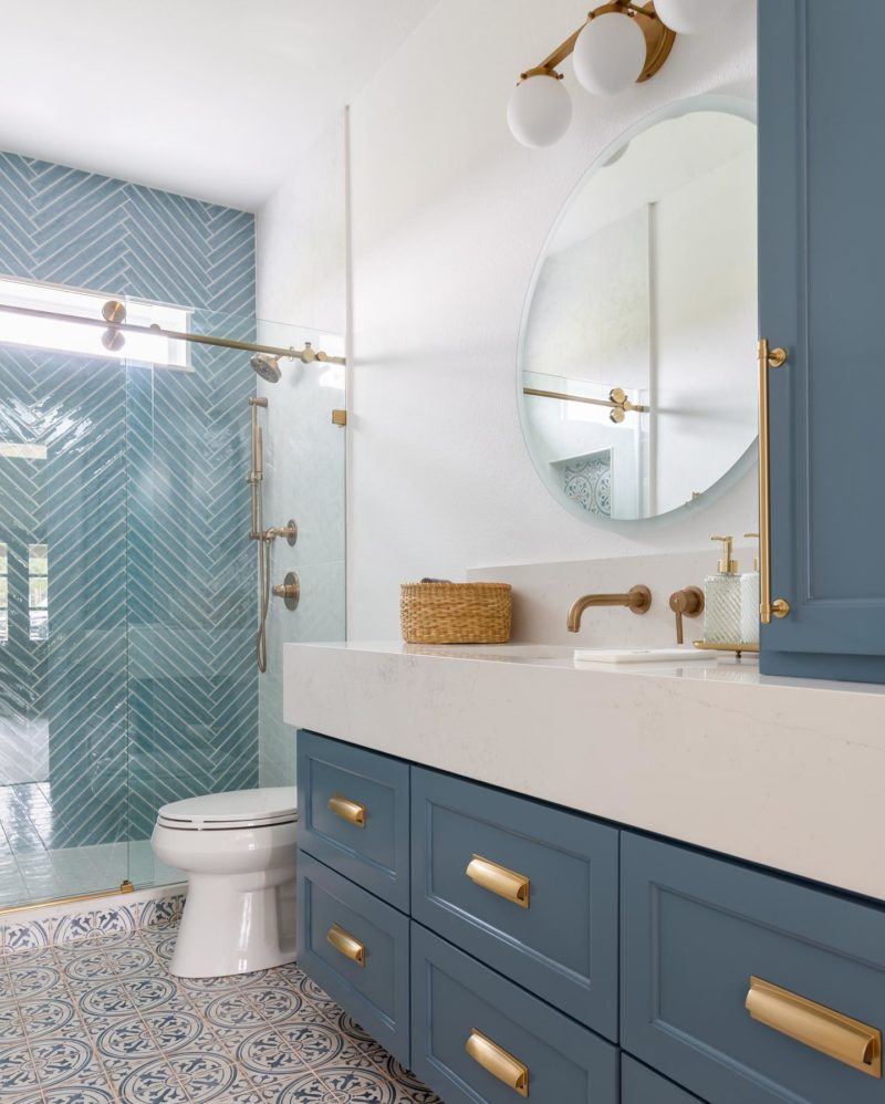 blue wall tile in the bathroom and pattern floor tile 