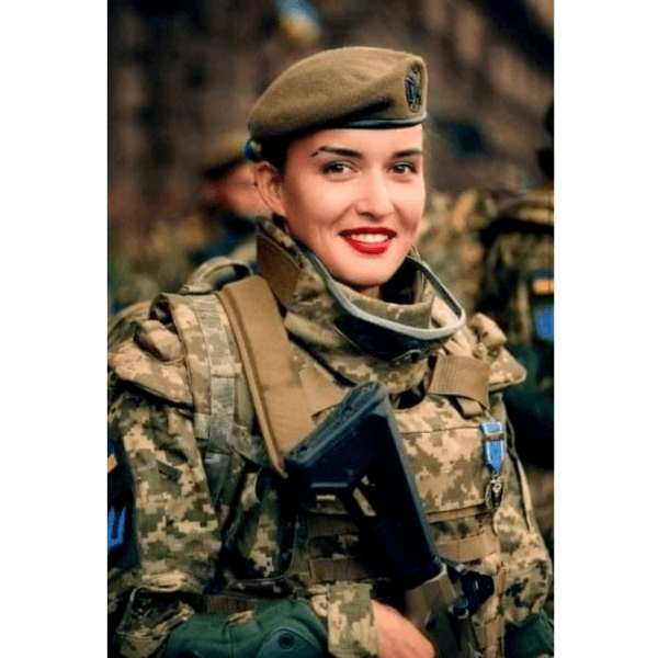 A Ukrainian woman soldier in military uniform 