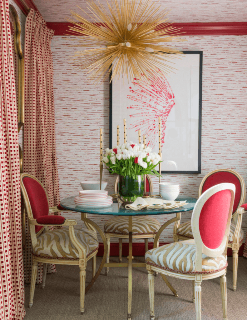 dining room in traditional interior design style with coral and beige 