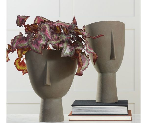 head planter with flowers 
